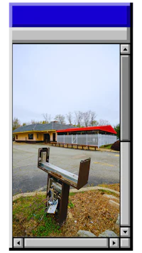 a photo of a bench in front of a building