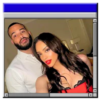 a man and woman posing for a selfie