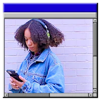a woman wearing a denim jacket