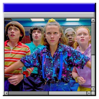 a group of people standing in front of a computer screen